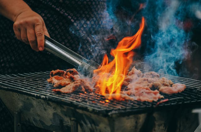 Meat cooking on a barbeque