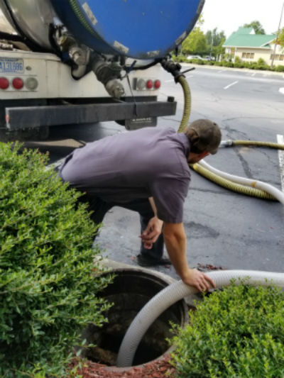 Pumping a grease trap